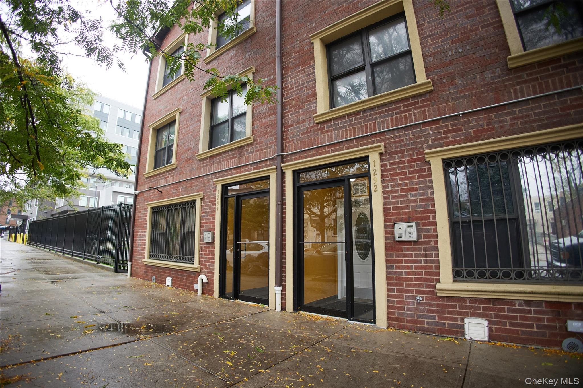 1292 Saint Marks Avenue, Unit 2 Brooklyn, NY 11213 - Photo 31 of 32 a view of a brick house with a large windows