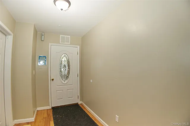 a view of a bathroom with wooden floor