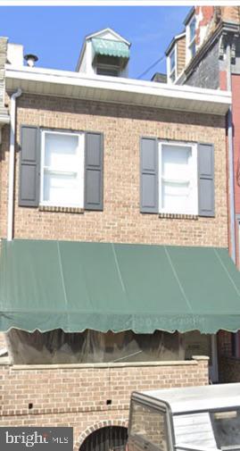 a view of a house with a outdoor space
