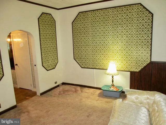 a bed room with a bed and a table