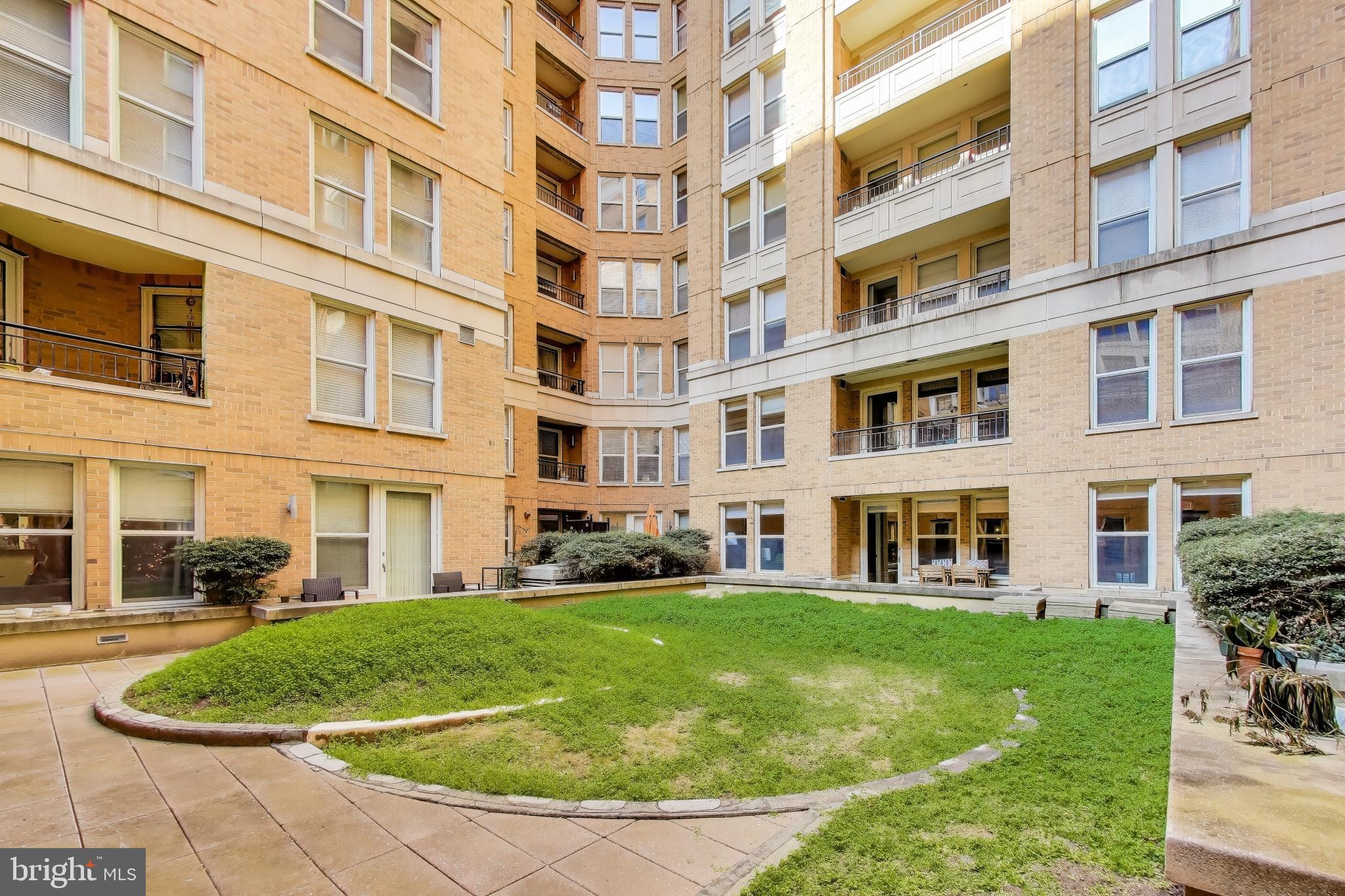 915 E Street Northwest, Unit 414 Washington, DC 20004 - Photo 34 of 35 a view of building with yard