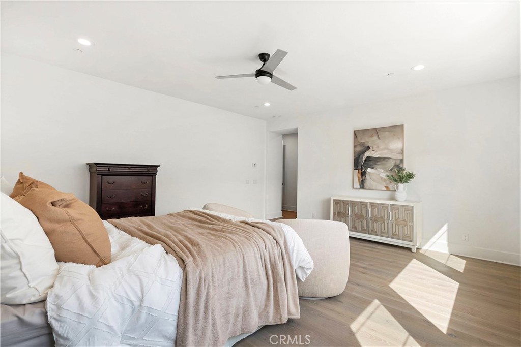 84 Rockinghorse Irvine, CA 92602 - Photo 42 of 63 a bedroom with a bed and a couch