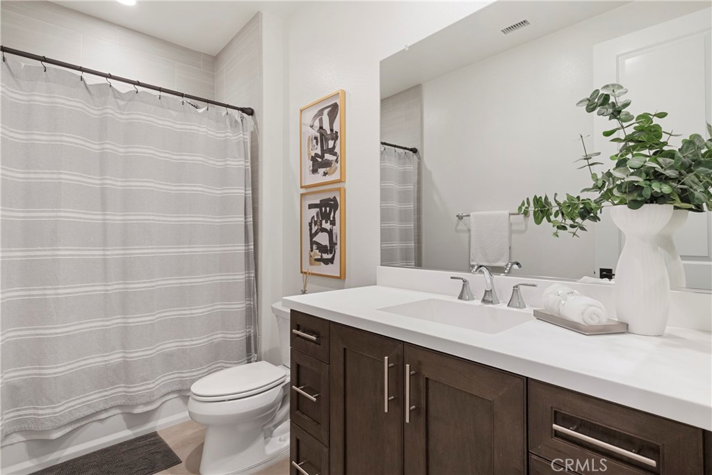 84 Rockinghorse Irvine, CA 92602 - Photo 48 of 63 a bathroom with a sink a toilet and shower