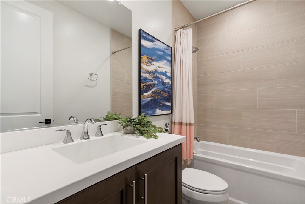 84 Rockinghorse Irvine, CA 92602 - Photo 50 of 63 a bathroom with a sink a toilet and shower