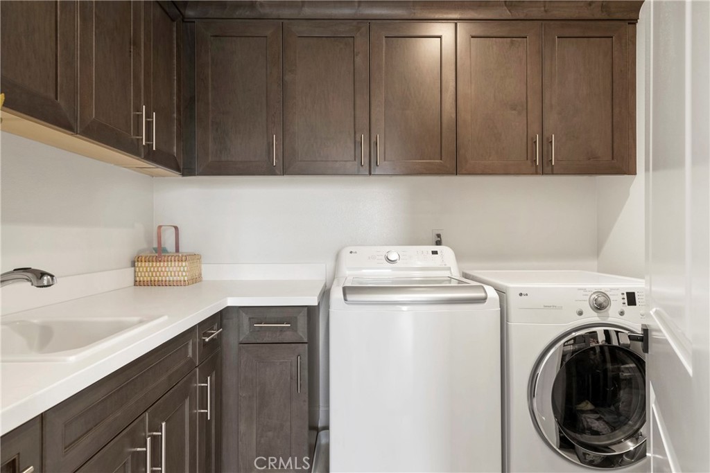 84 Rockinghorse Irvine, CA 92602 - Photo 53 of 63 a utility room with dryer and washer