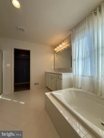 a view of a kitchen with a sink