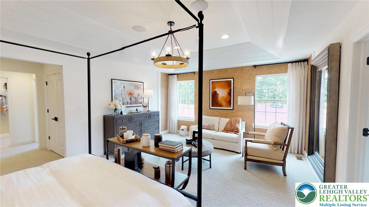 5137 Schantz Road, Unit THE ROOSEVELT Allentown, PA 18104 - Photo 29 of 39 a bedroom with furniture and a window