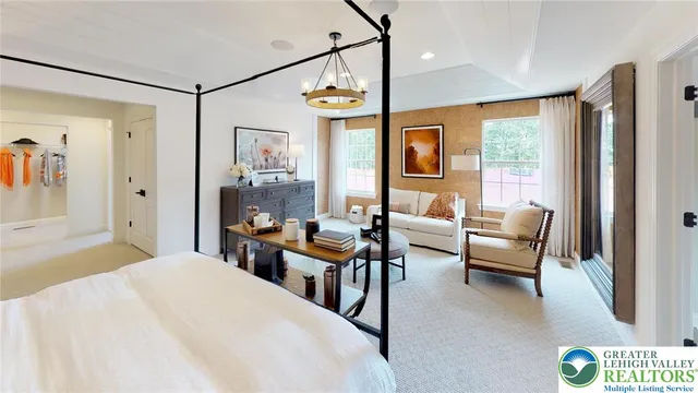a kitchen with a dining table chairs and window
