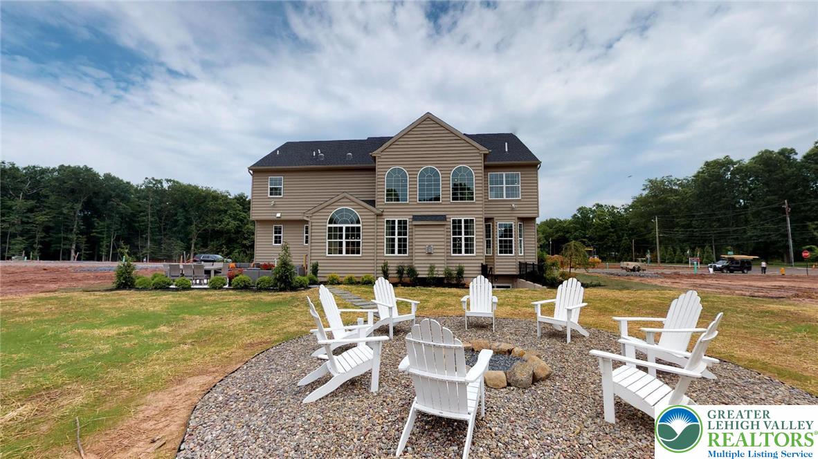 5137 Schantz Road, Unit THE ROOSEVELT Allentown, PA 18104 - Photo 38 of 39 a view of a house with swimming pool and sitting area