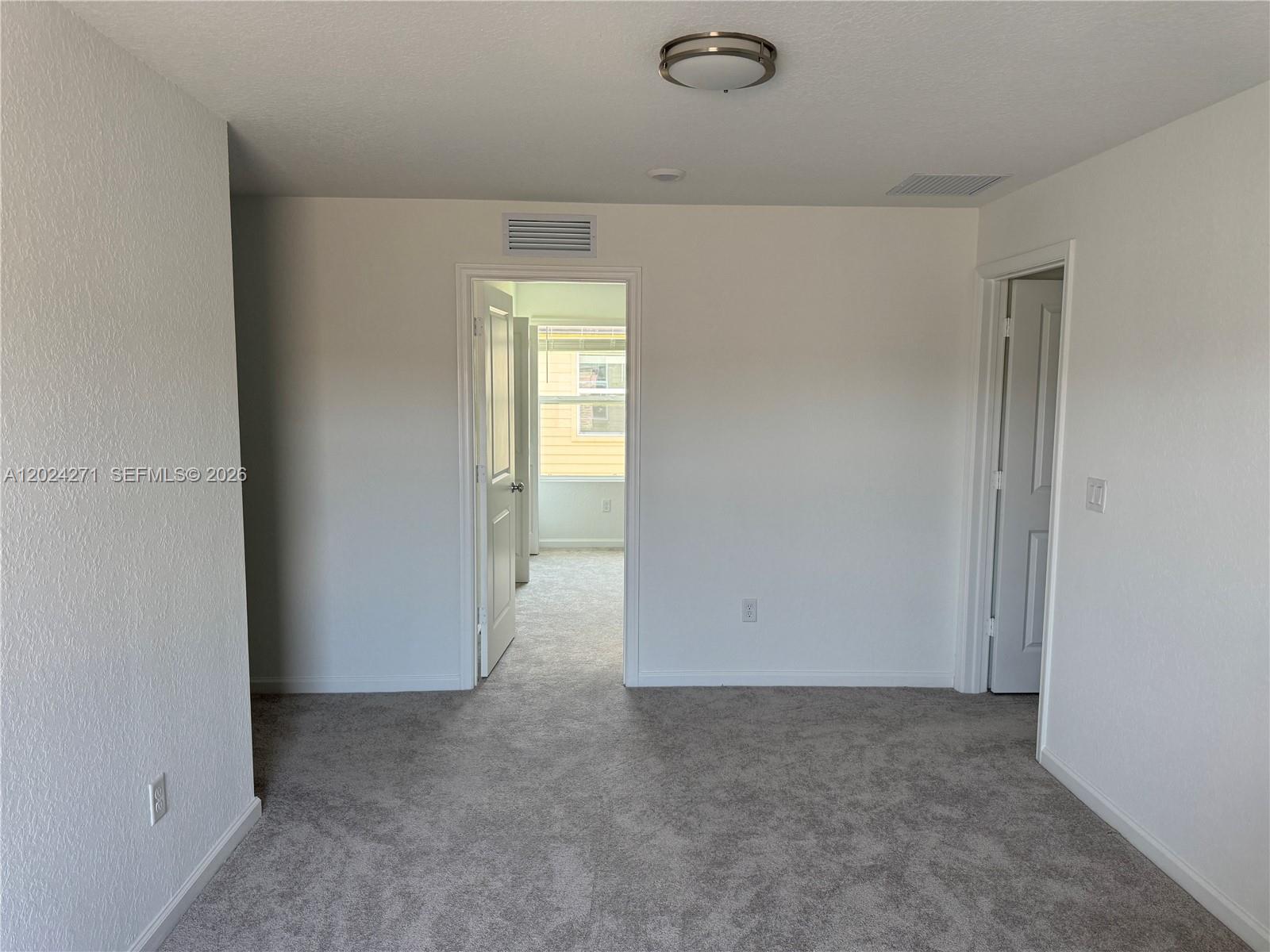 693 Carlyle Way Fort Pierce, FL 34947 - Photo 5 of 19 a view of an empty room
