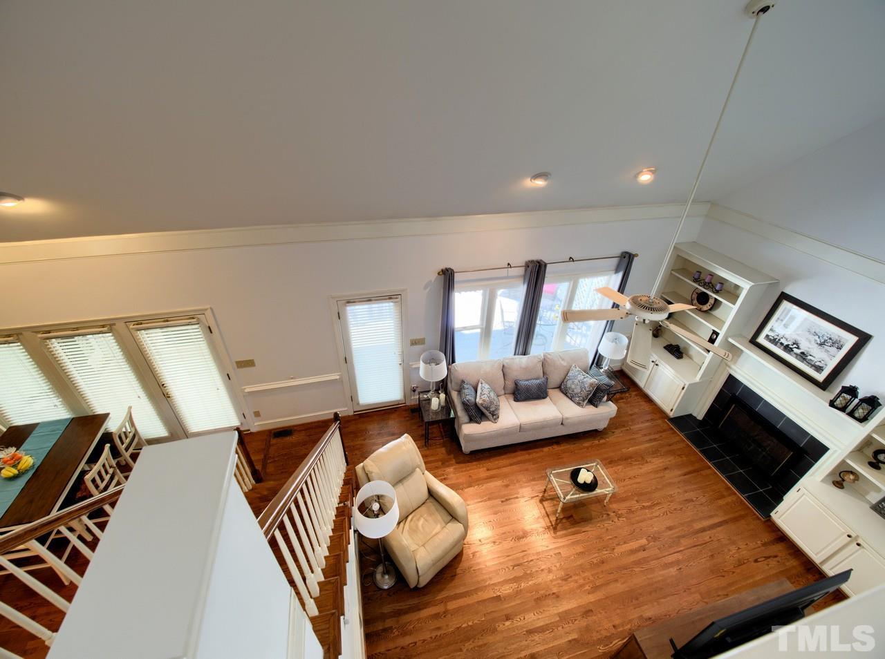 7901 Sandy Bottom Way Raleigh, NC 27613 - Photo 17 of 28 a living room with furniture and a flat screen tv