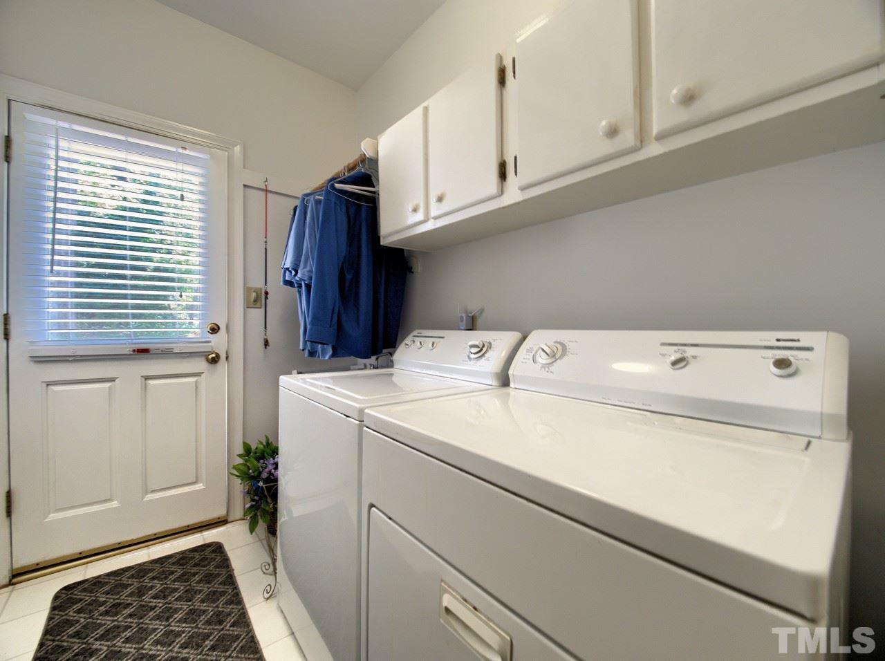 7901 Sandy Bottom Way Raleigh, NC 27613 - Photo 19 of 28 a utility room with dryer and washer
