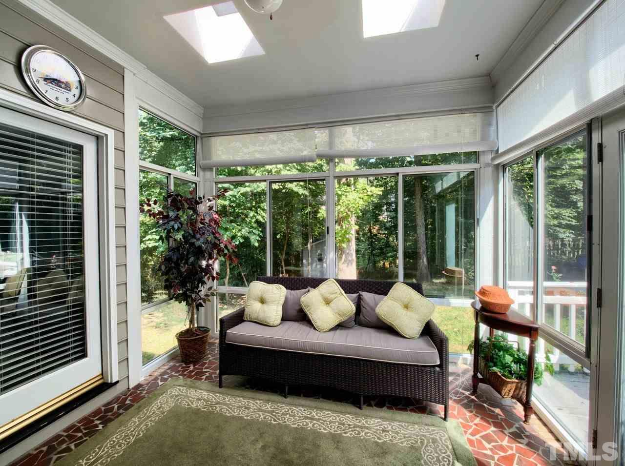 7901 Sandy Bottom Way Raleigh, NC 27613 - Photo 24 of 28 a outdoor living space with furniture and garden view