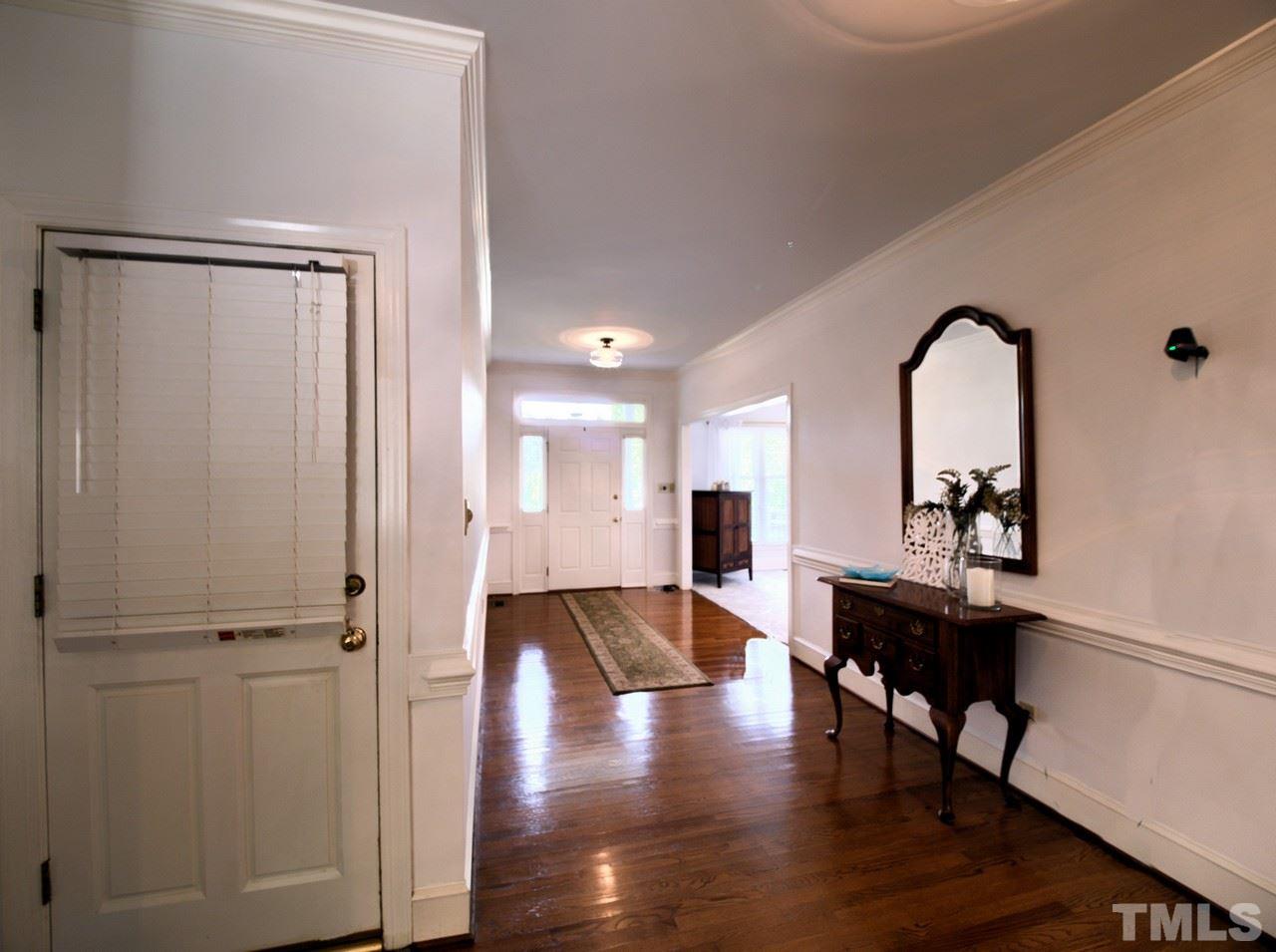 7901 Sandy Bottom Way Raleigh, NC 27613 - Photo 5 of 28 a view of a room with furniture and wooden floor