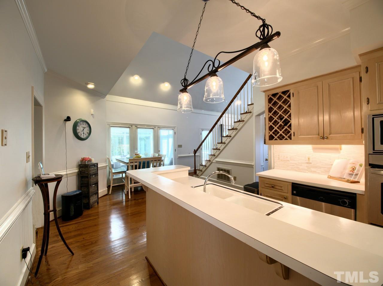 7901 Sandy Bottom Way Raleigh, NC 27613 - Photo 9 of 28 a view of a dining room with furniture window and wooden floor