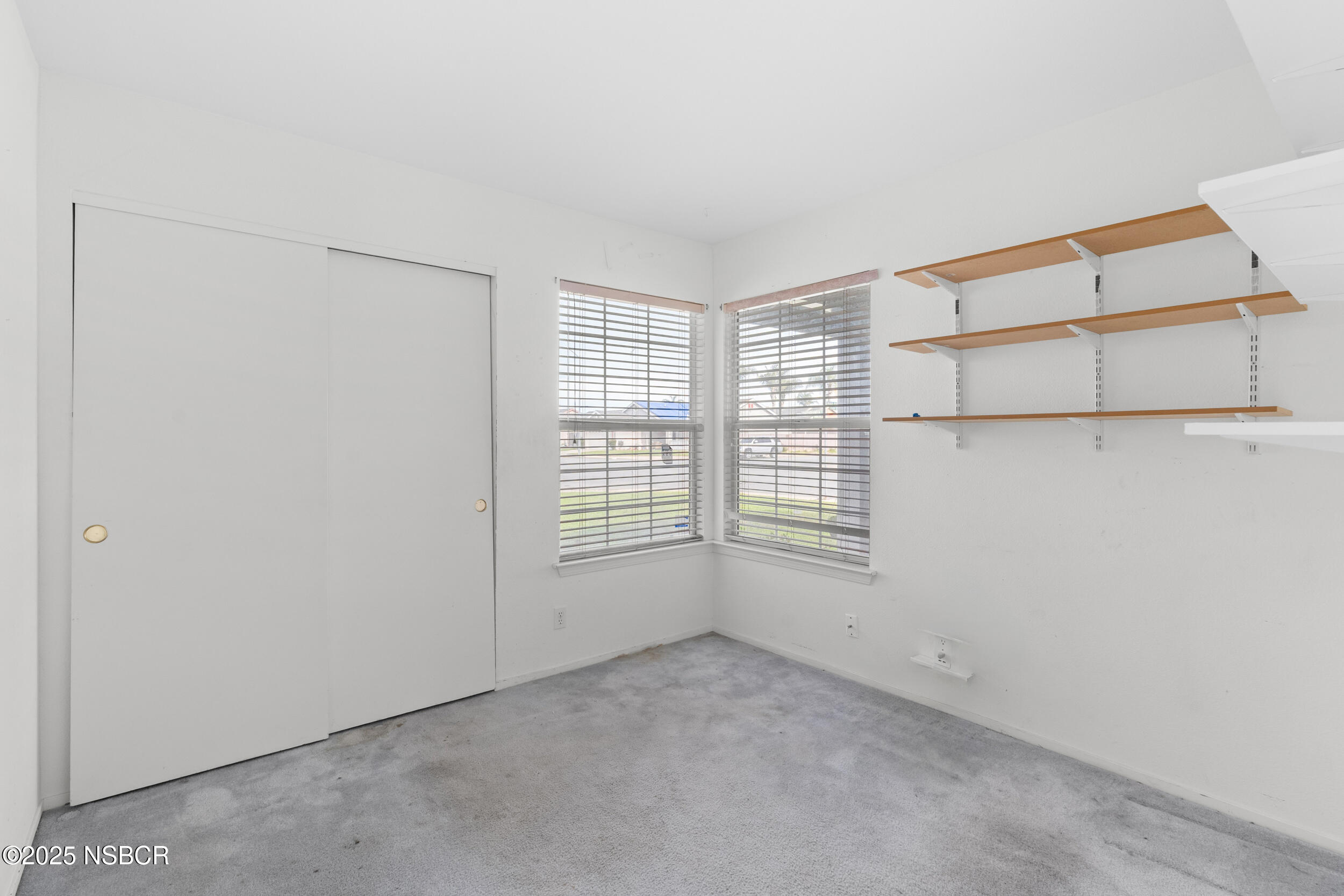 1458 Jacaranda Court Santa Maria, CA 93458 - Photo 18 of 24 a view of an empty room with a window