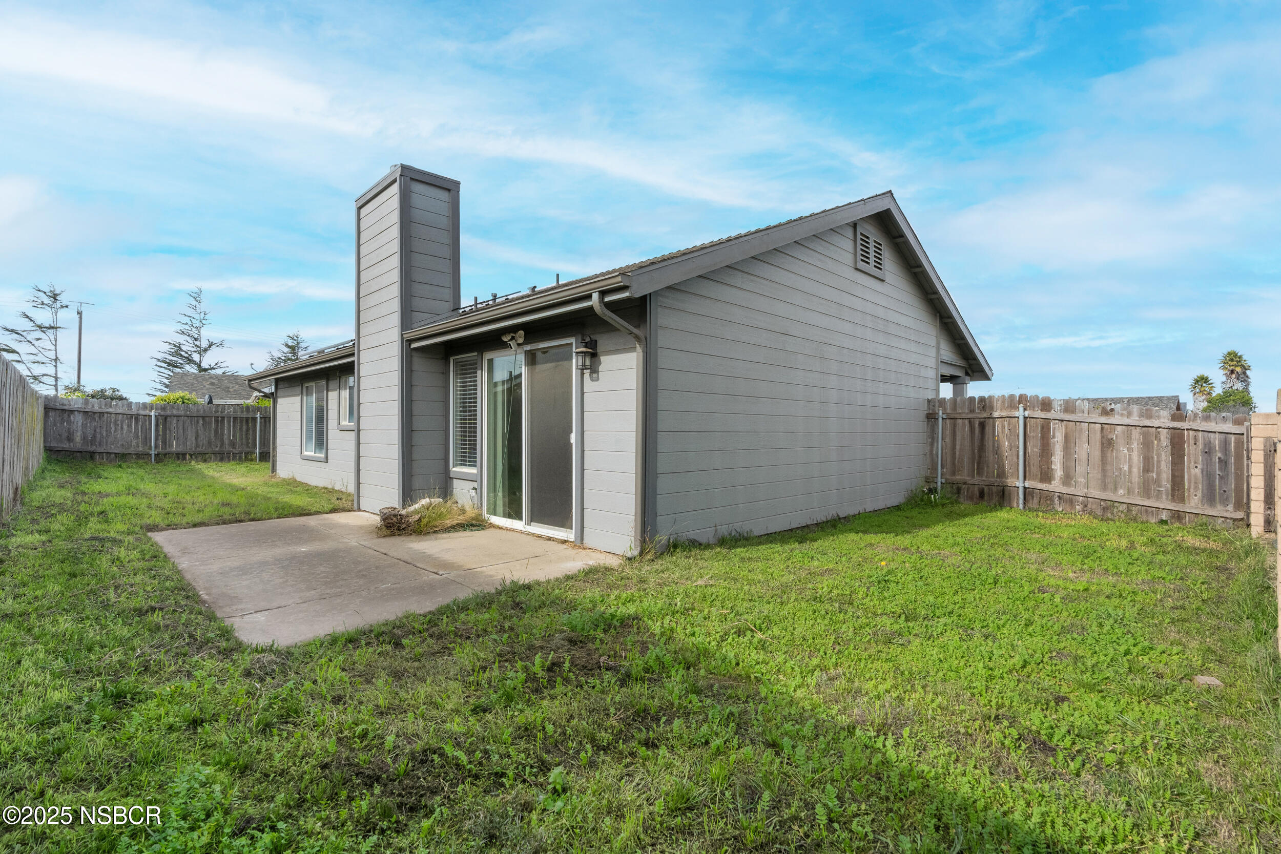 1458 Jacaranda Court Santa Maria, CA 93458 - Photo 21 of 24 a backyard of a house with lots of green space