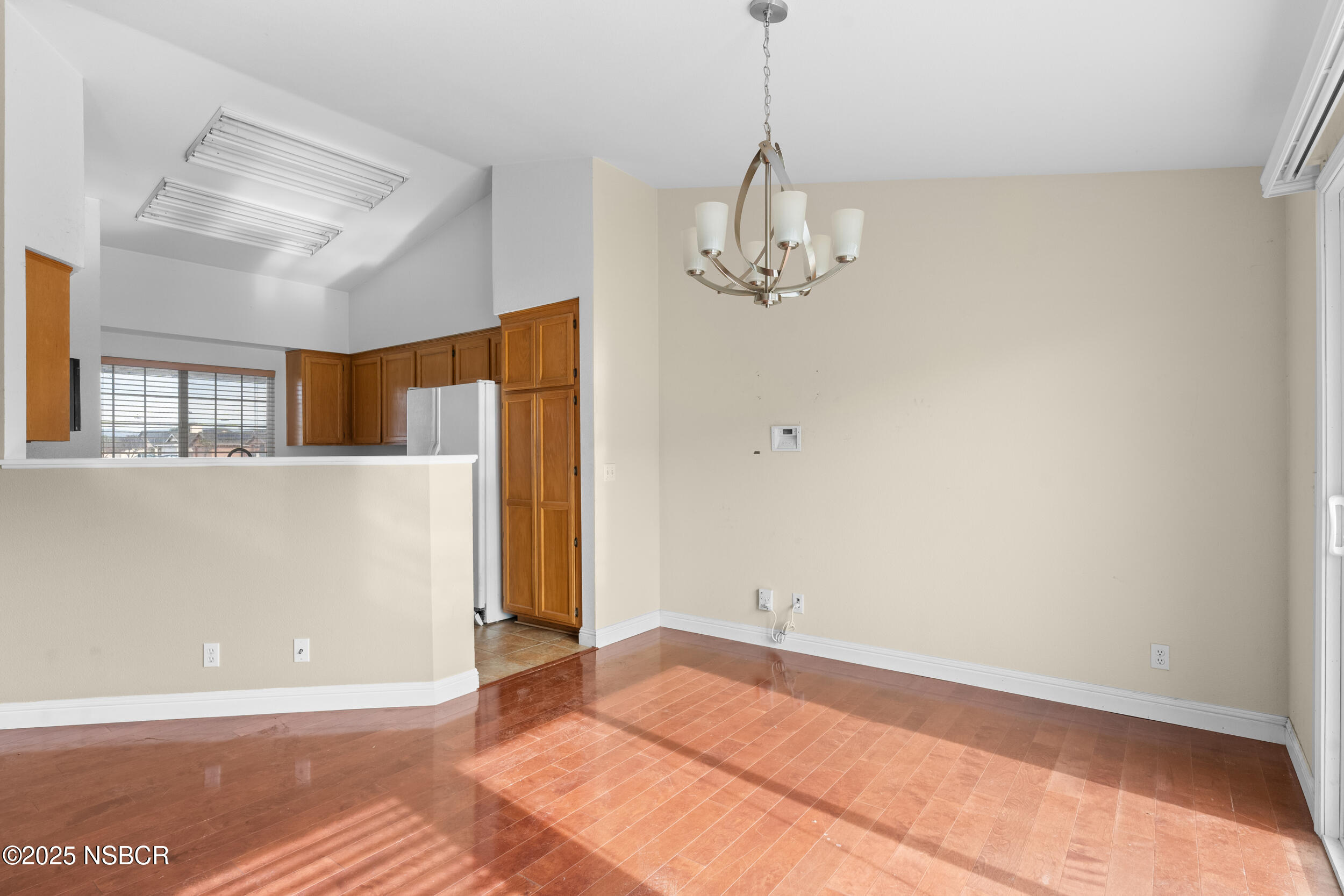 1458 Jacaranda Court Santa Maria, CA 93458 - Photo 6 of 24 a view of empty room with wooden floor
