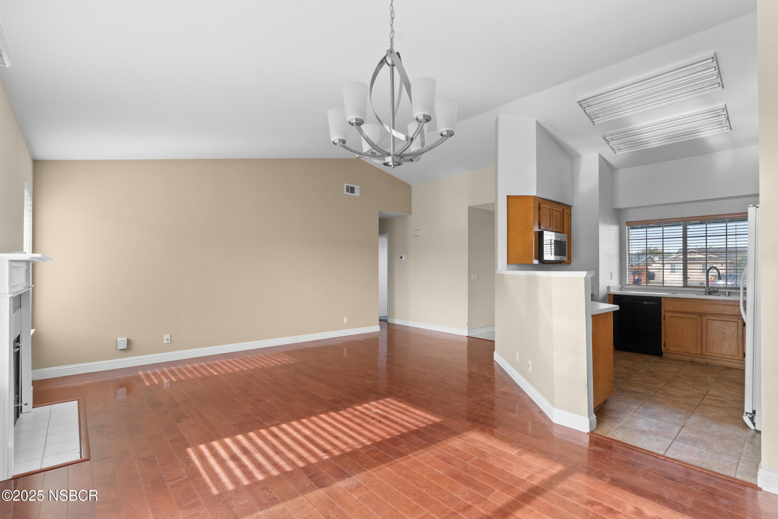 1458 Jacaranda Court Santa Maria, CA 93458 - Photo 10 of 24 a view of an empty room with a window