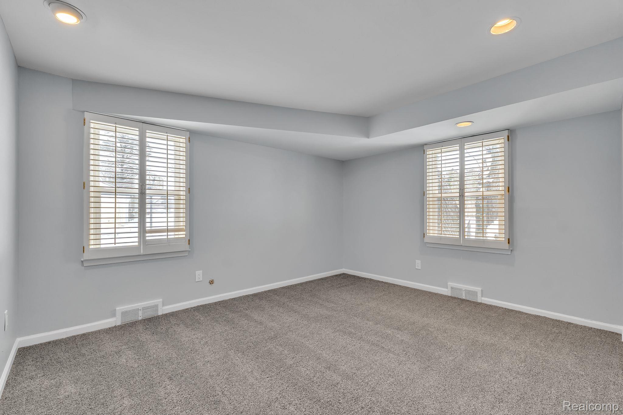6576 Inkster Road West Bloomfield, MI 48322 - Photo 46 of 62 Spare room featuring recessed lighting and carpet flooring