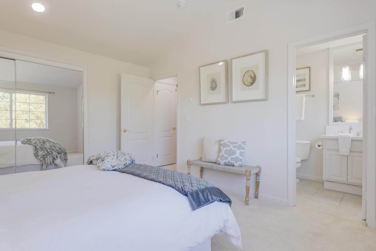 20 Willow Road, Unit 26 Menlo Park, CA 94025 - Photo 11 of 20 a bedroom with a bed and a lamp