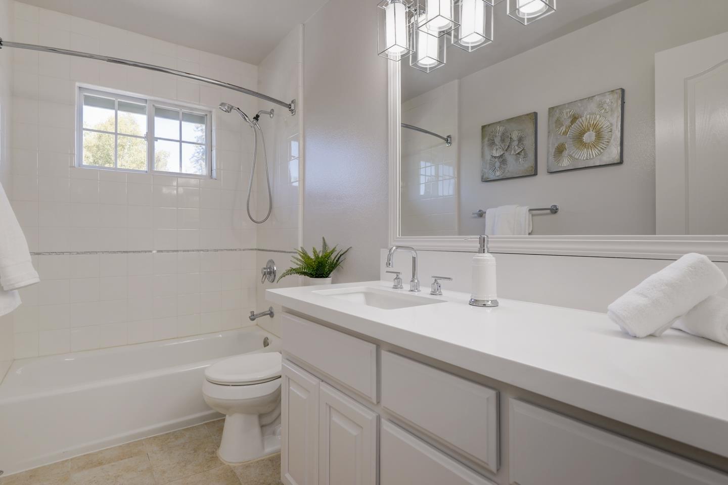 20 Willow Road, Unit 26 Menlo Park, CA 94025 - Photo 13 of 20 a bathroom with a sink a toilet and shower