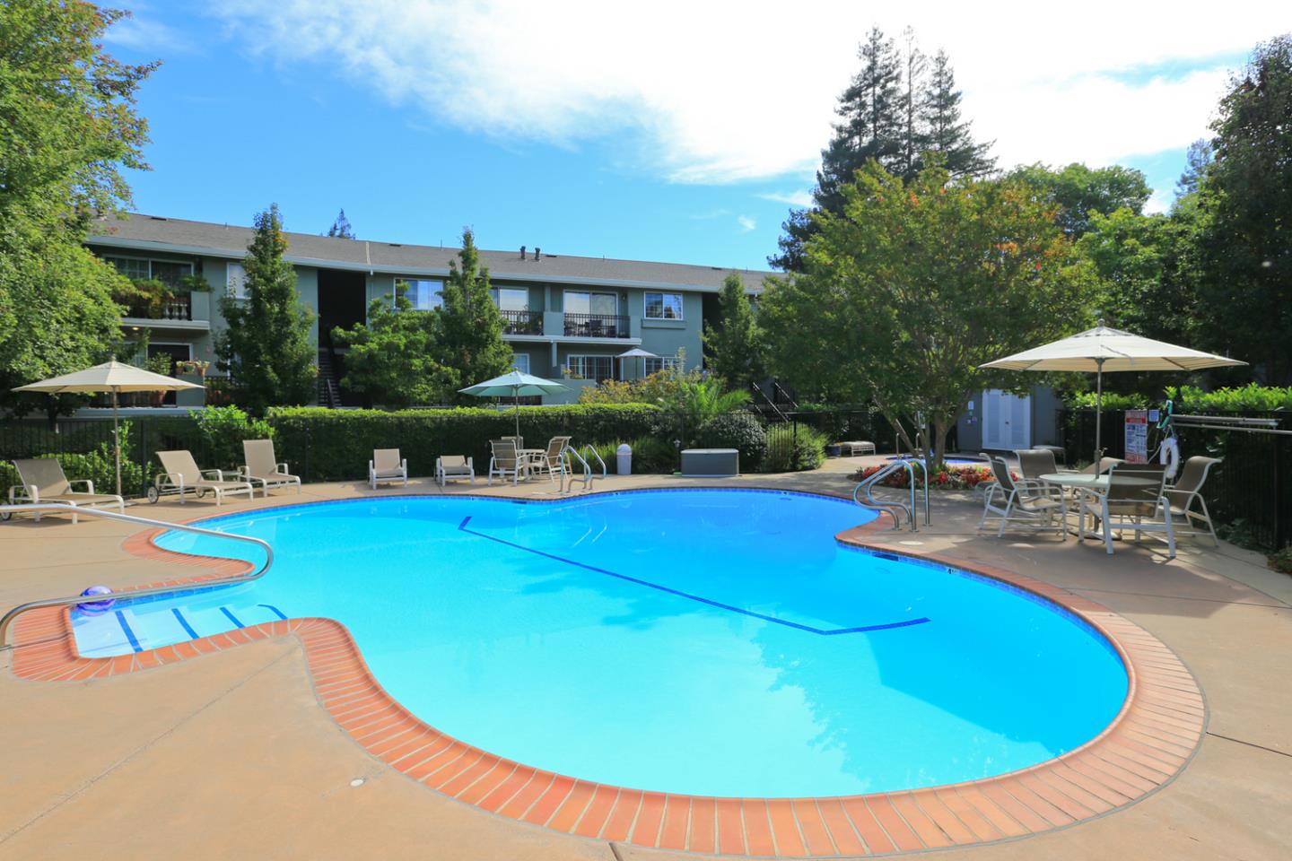 20 Willow Road, Unit 26 Menlo Park, CA 94025 - Photo 17 of 20 a view of a swimming pool with outdoor seating