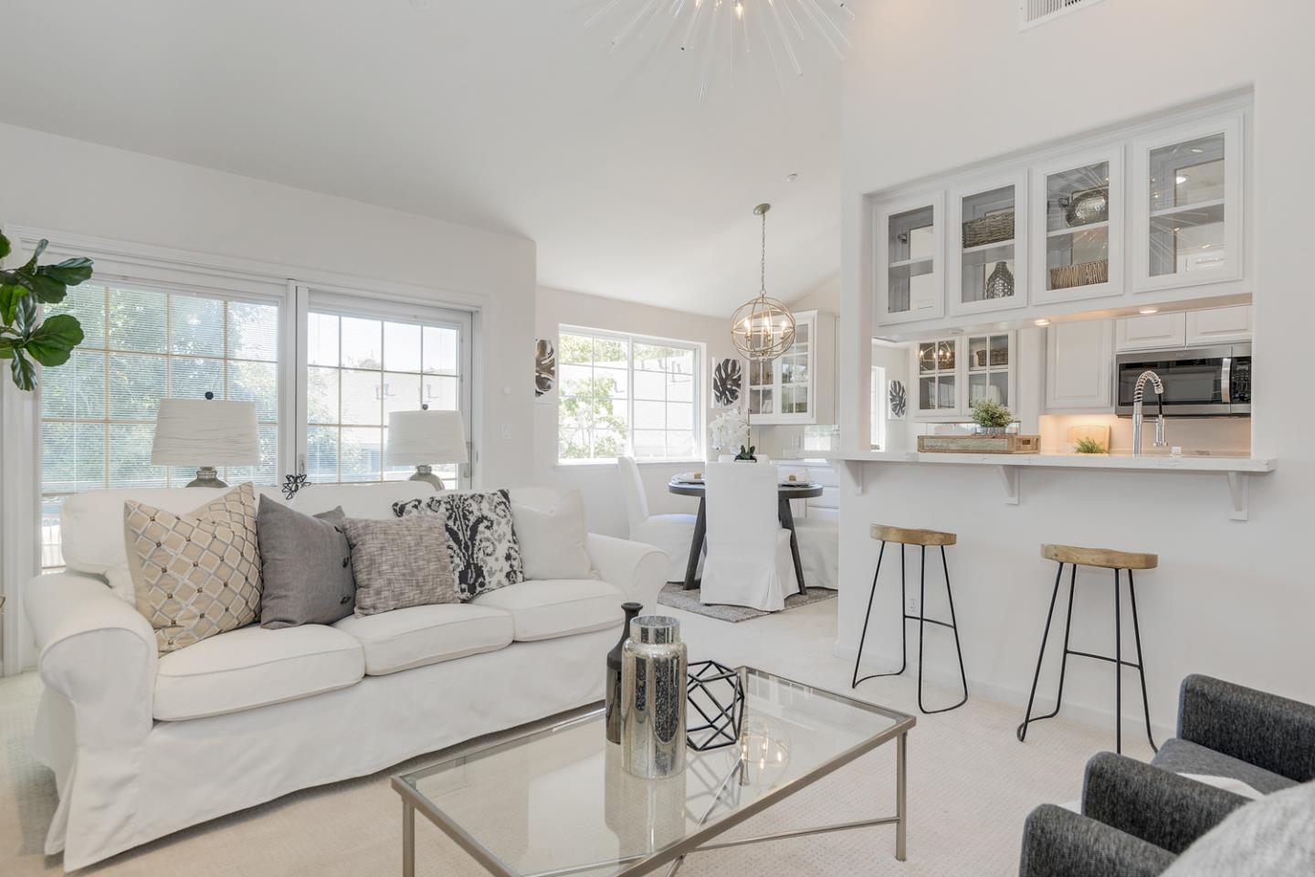 20 Willow Road, Unit 26 Menlo Park, CA 94025 - Photo 4 of 20 a living room with furniture and a table