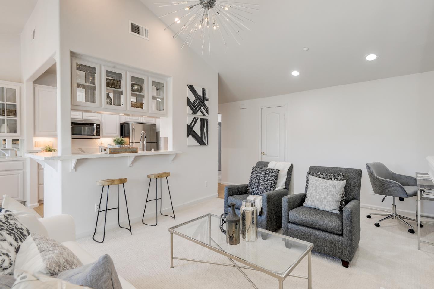 20 Willow Road, Unit 26 Menlo Park, CA 94025 - Photo 5 of 20 a living room with furniture a rug and white walls