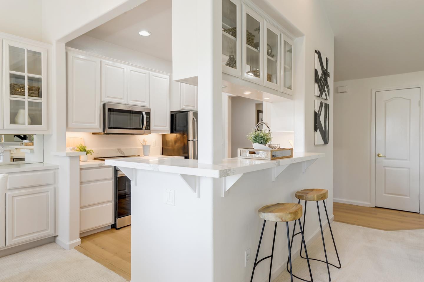 20 Willow Road, Unit 26 Menlo Park, CA 94025 - Photo 7 of 20 a kitchen with a sink cabinets and microwave