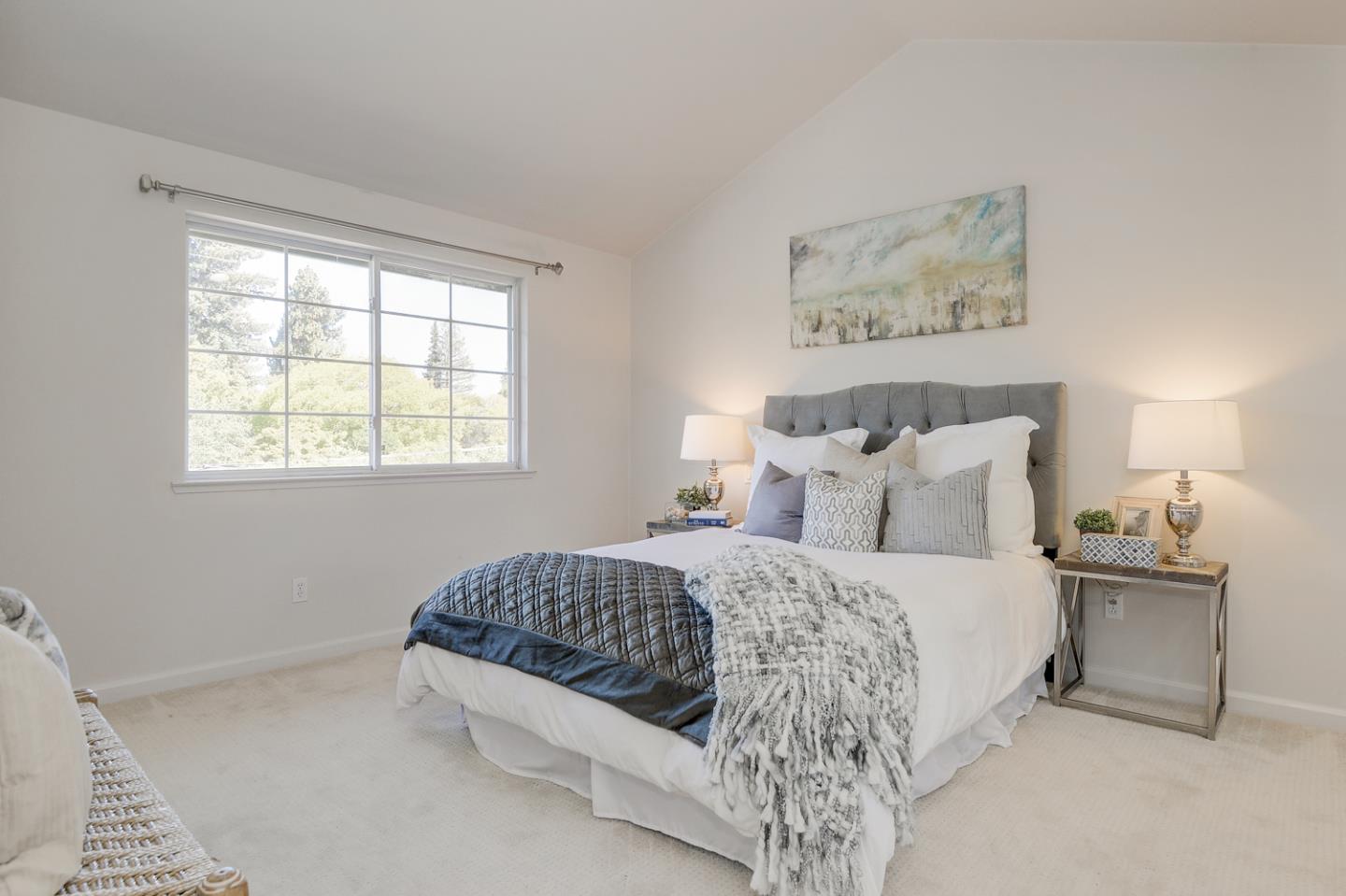 20 Willow Road, Unit 26 Menlo Park, CA 94025 - Photo 10 of 20 a bedroom with a bed and a lamp