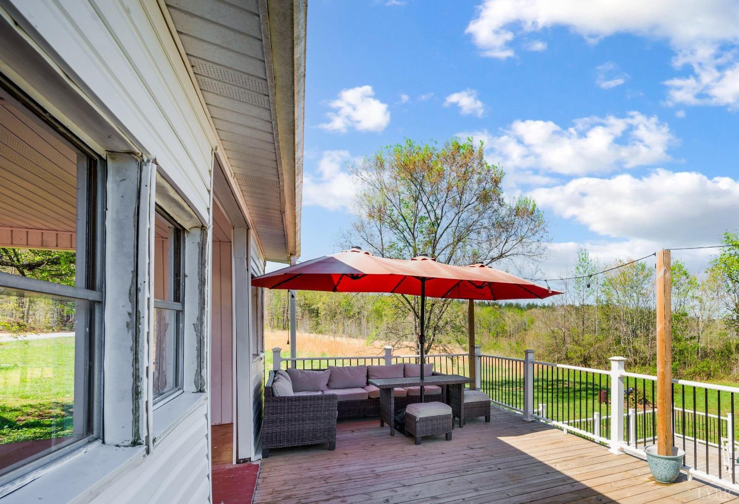 2477 Mountain Road Java, VA 24565 - Photo 23 of 33 a view of a balcony with furniture and a garden