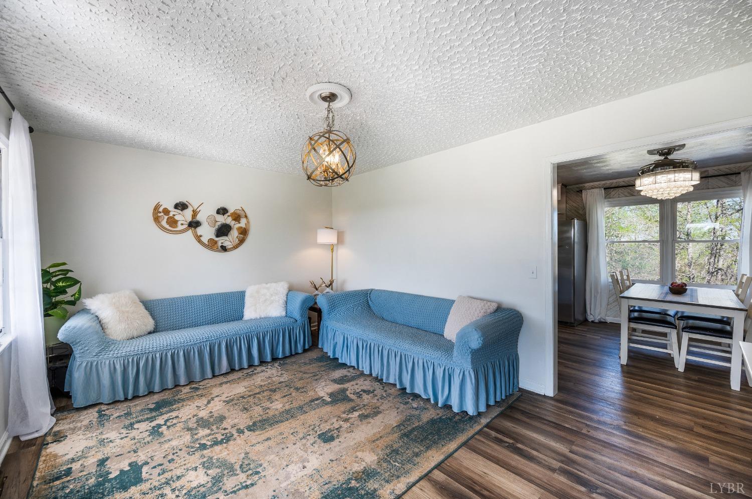 2477 Mountain Road Java, VA 24565 - Photo 6 of 33 a living room with furniture and wooden floor