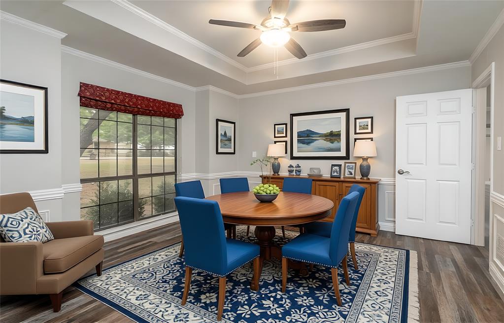 13 Crestview Circle Rockwall, TX 75087 - Photo 7 of 37 a view of a dining room with furniture window and wooden floor