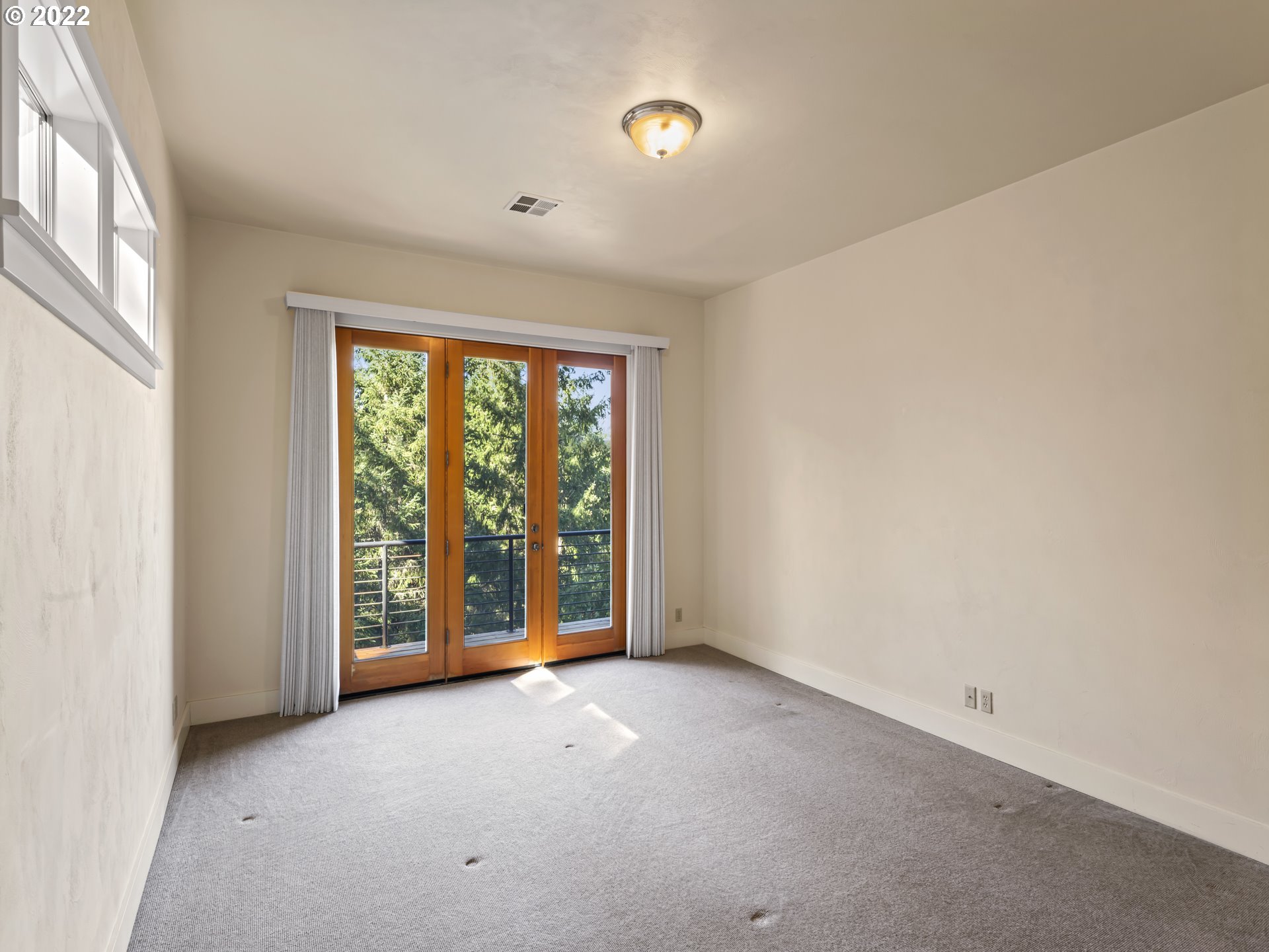 30923 Fox Hollow Road Eugene, OR 97405 - Photo 14 of 31 an empty room with windows