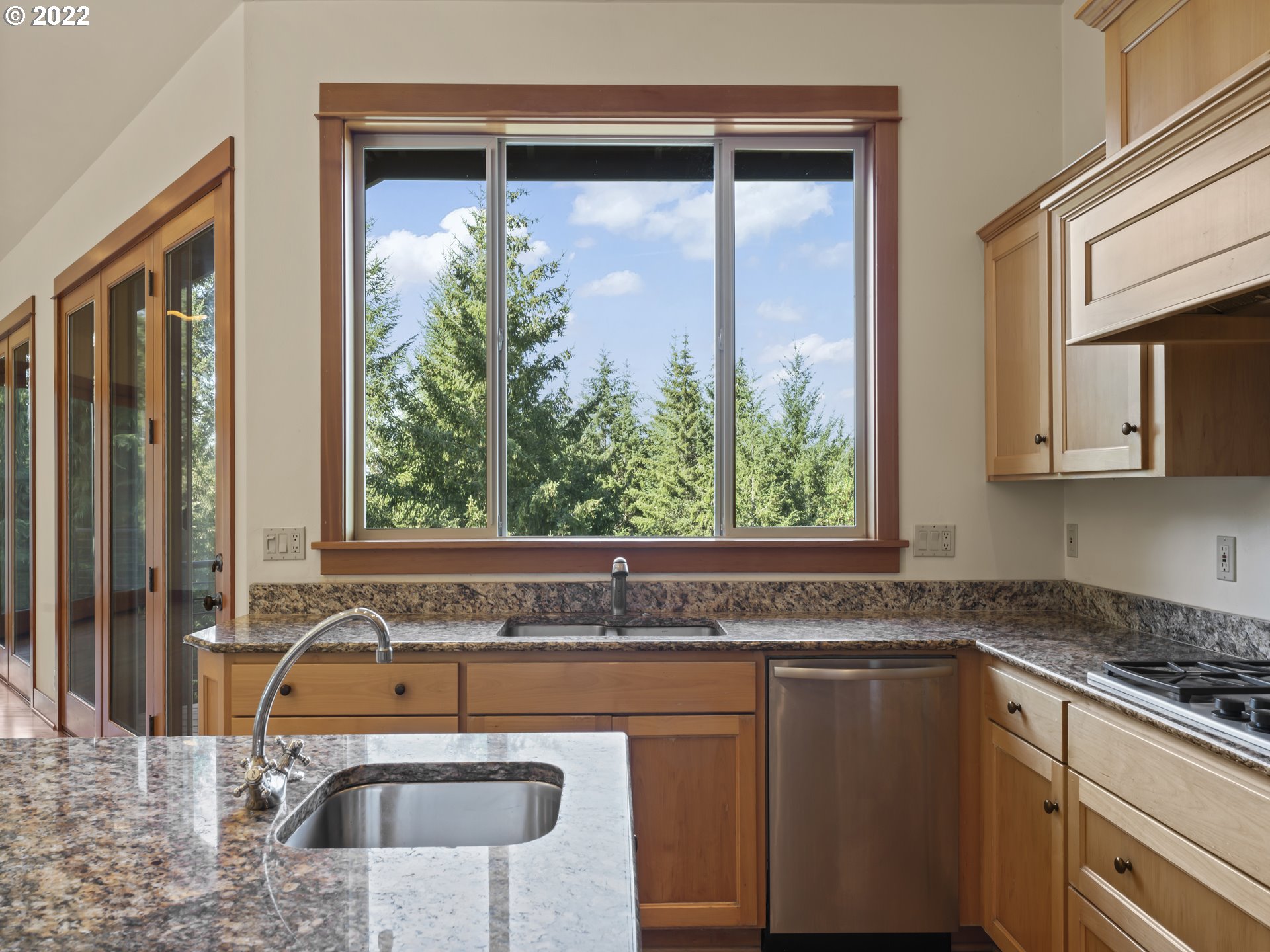 30923 Fox Hollow Road Eugene, OR 97405 - Photo 10 of 31 a view of a sink a mirror and a window
