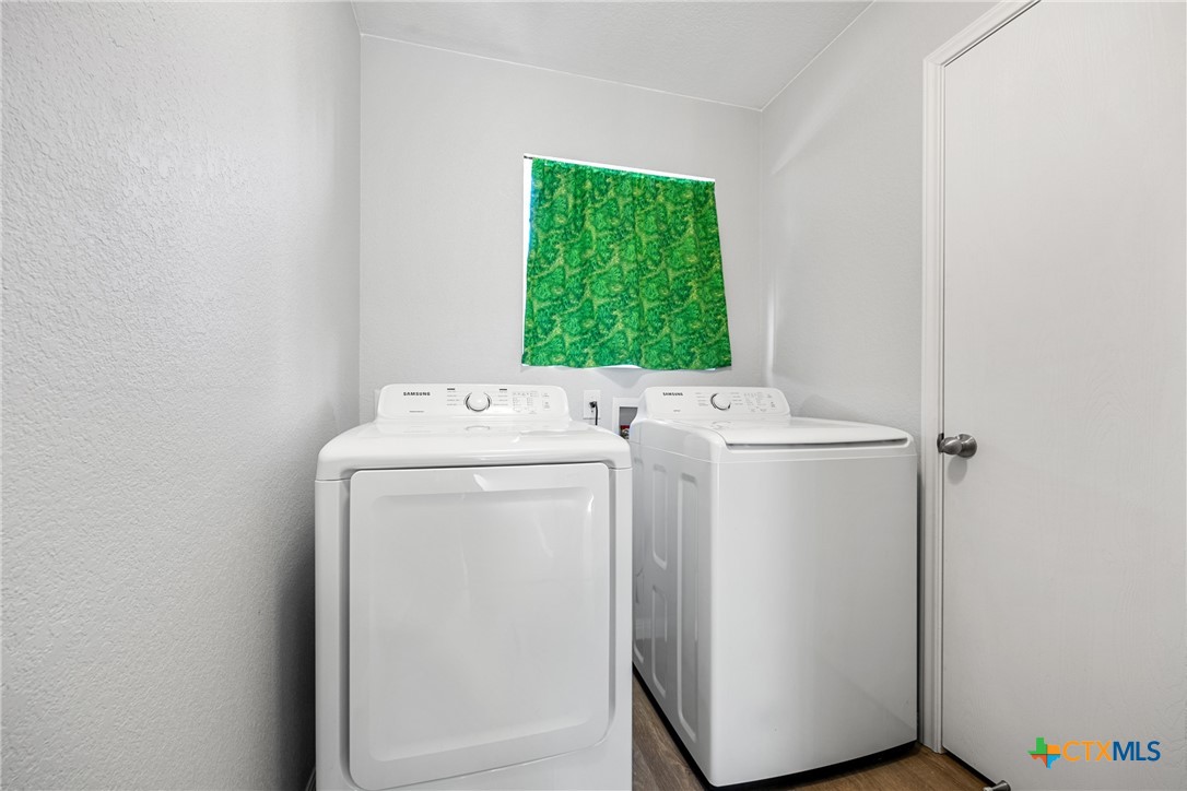 3410 Regency Court Killeen, TX 76549 - Photo 11 of 27 a utility room with dryer and washer