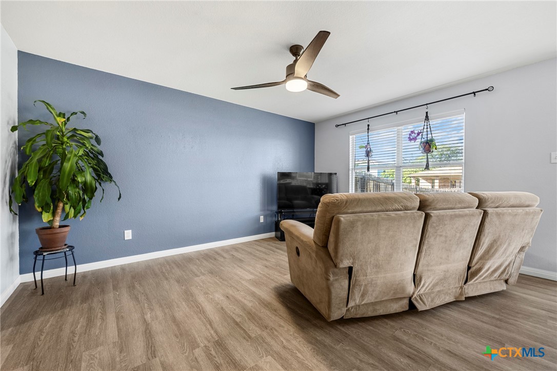 3410 Regency Court Killeen, TX 76549 - Photo 18 of 27 a living room with furniture and a potted plant