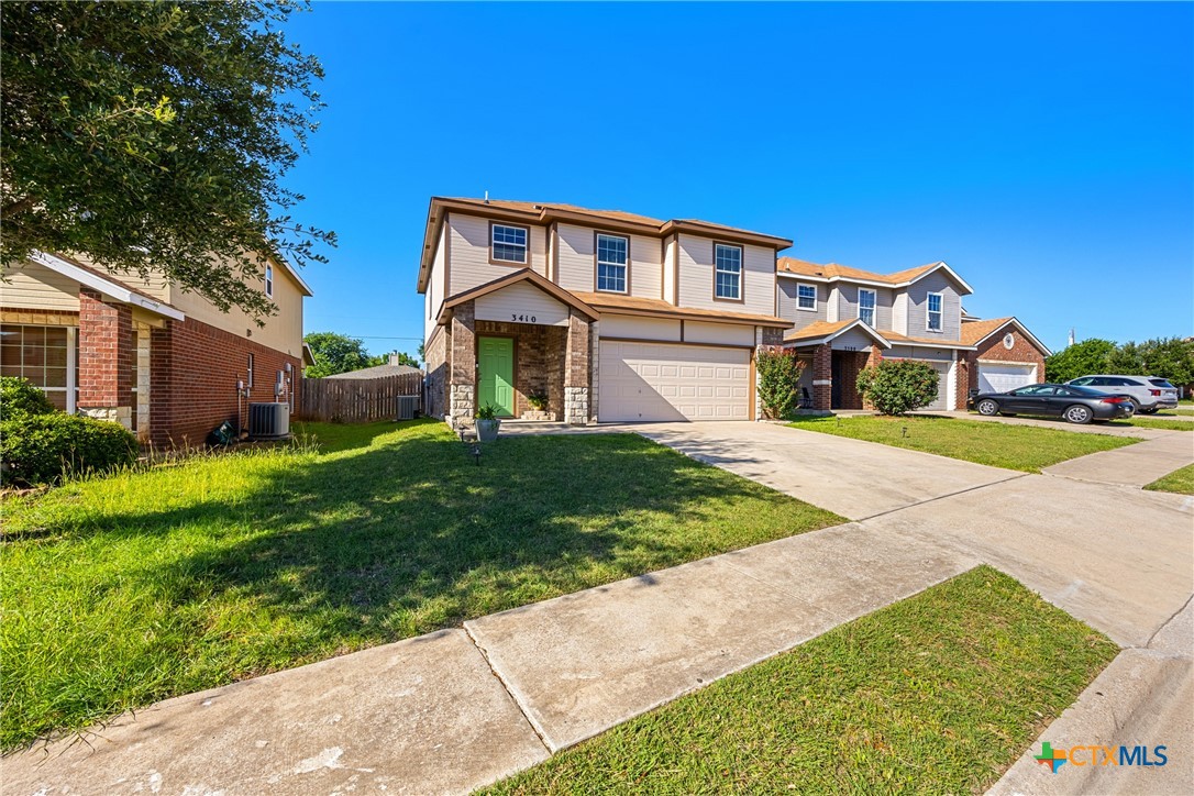 3410 Regency Court Killeen, TX 76549 - Photo 3 of 27 a front view of a house with a yard