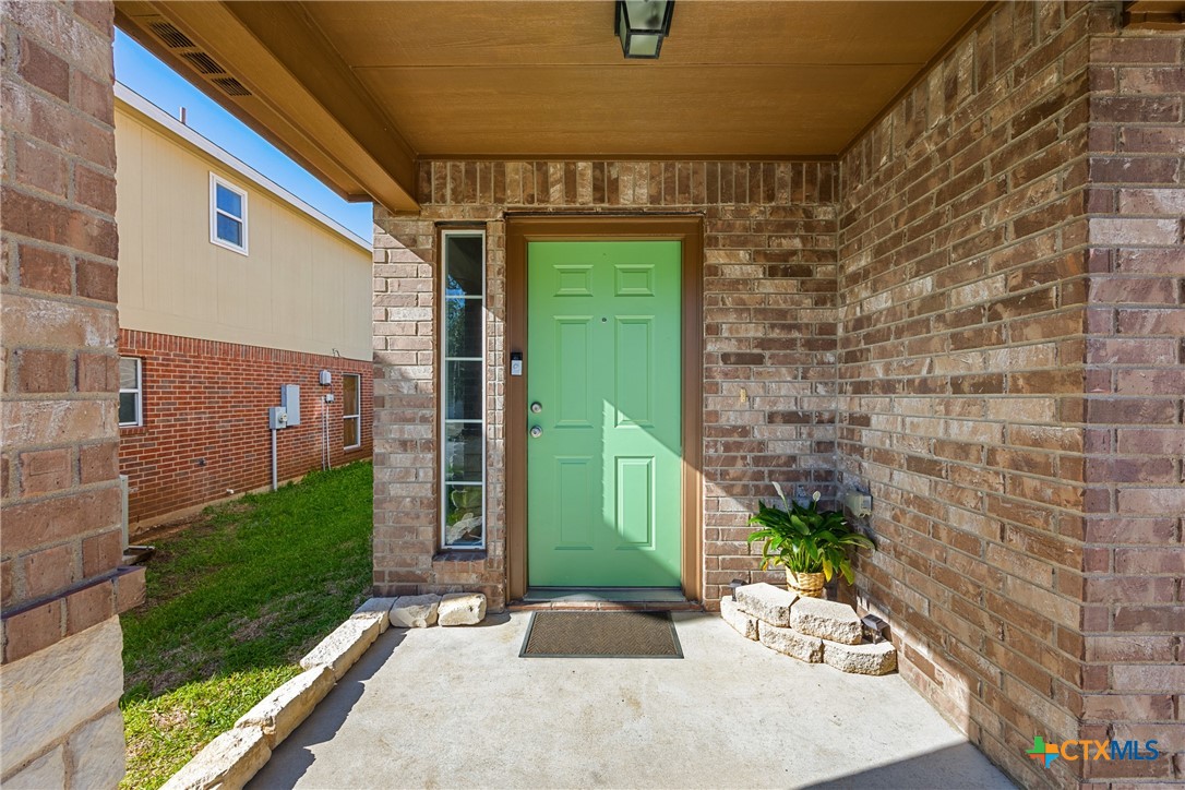 3410 Regency Court Killeen, TX 76549 - Photo 4 of 27 a front view of a house with a yard