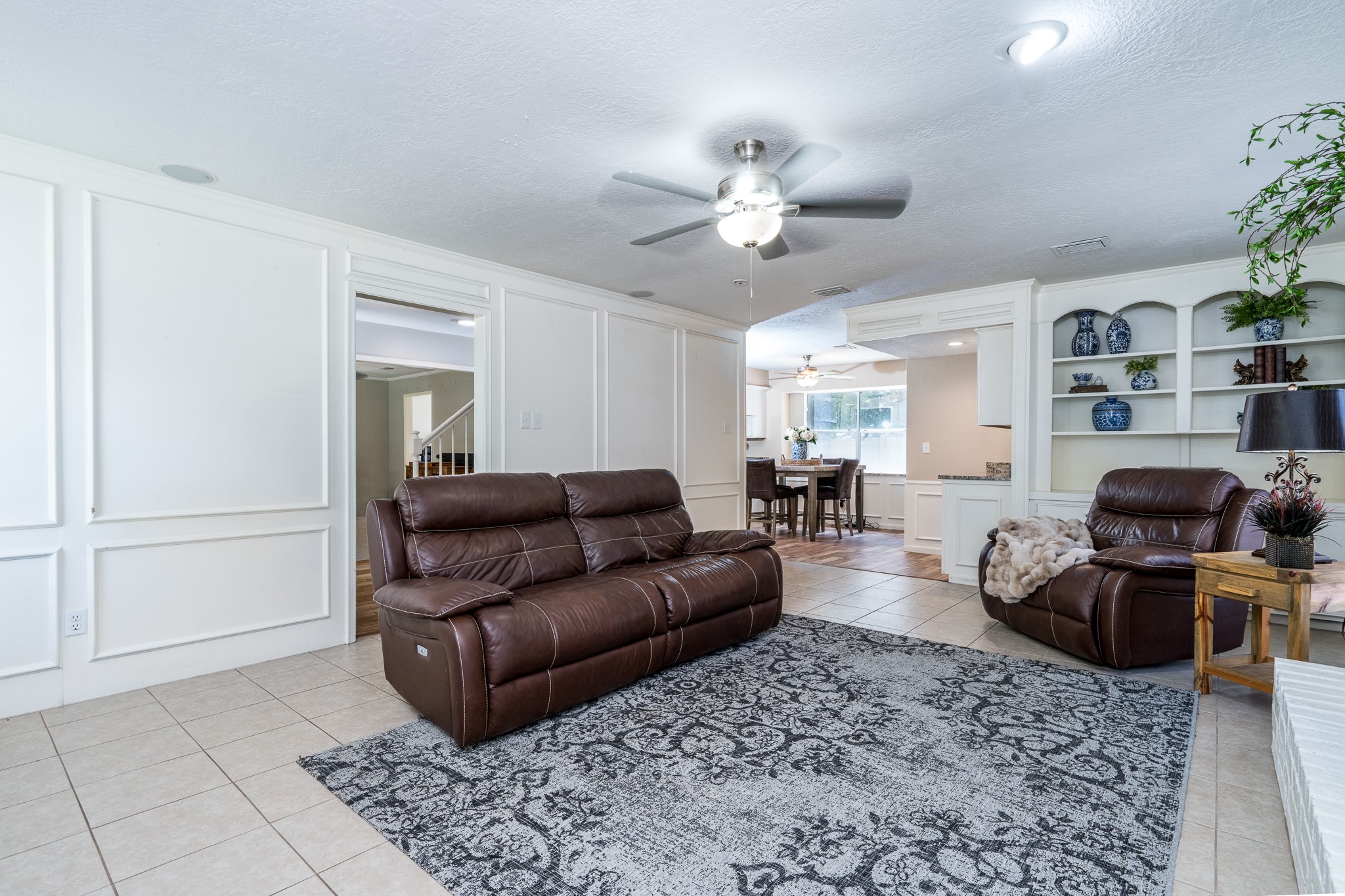 6527 Castle Pine Lane Spring, TX 77379 - Photo 15 of 47 Its welcoming atmosphere makes it the perfect gathering place for both casual living and entertaining.