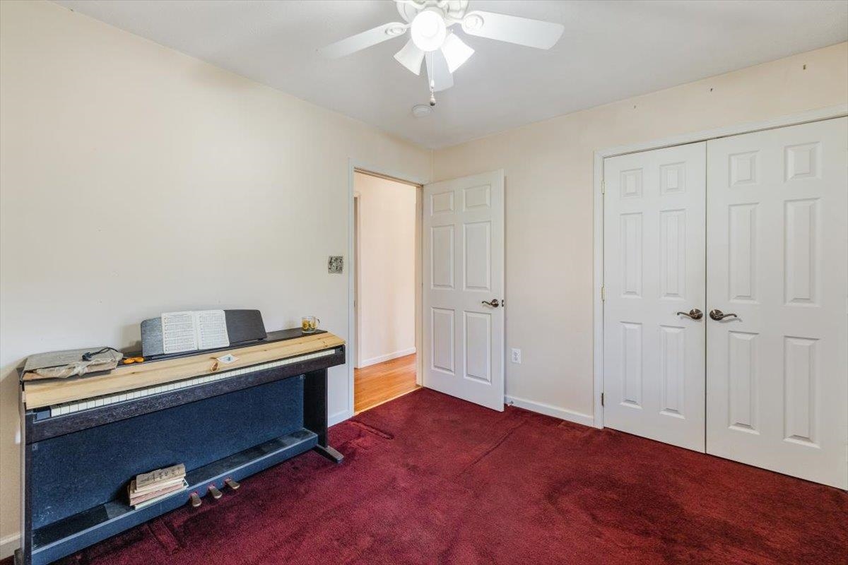 1182 Mullins Road Rio, WV 26755 - Photo 14 of 37 a view of an empty room with a workspace