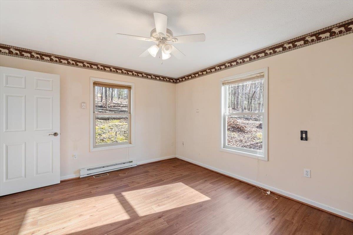 1182 Mullins Road Rio, WV 26755 - Photo 18 of 37 a view of an empty room with a window