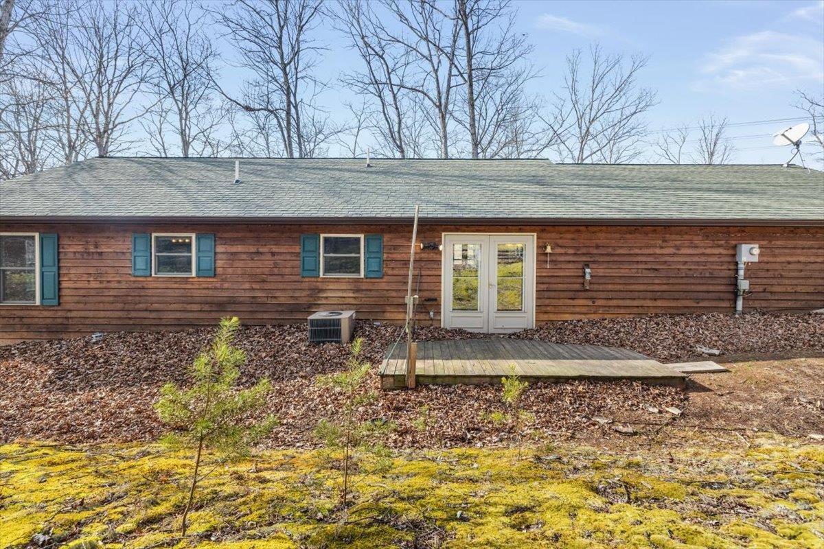 1182 Mullins Road Rio, WV 26755 - Photo 23 of 37 a view of a house with a yard