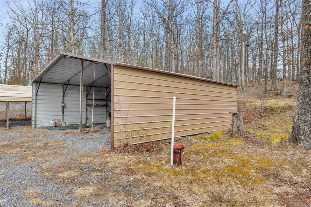 1182 Mullins Road Rio, WV 26755 - Photo 27 of 37 a backyard of a house