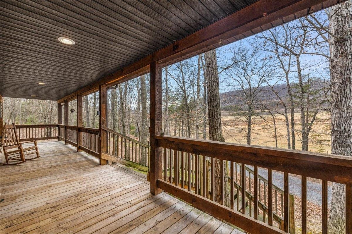 1182 Mullins Road Rio, WV 26755 - Photo 29 of 37 a view of a balcony with wooden floor