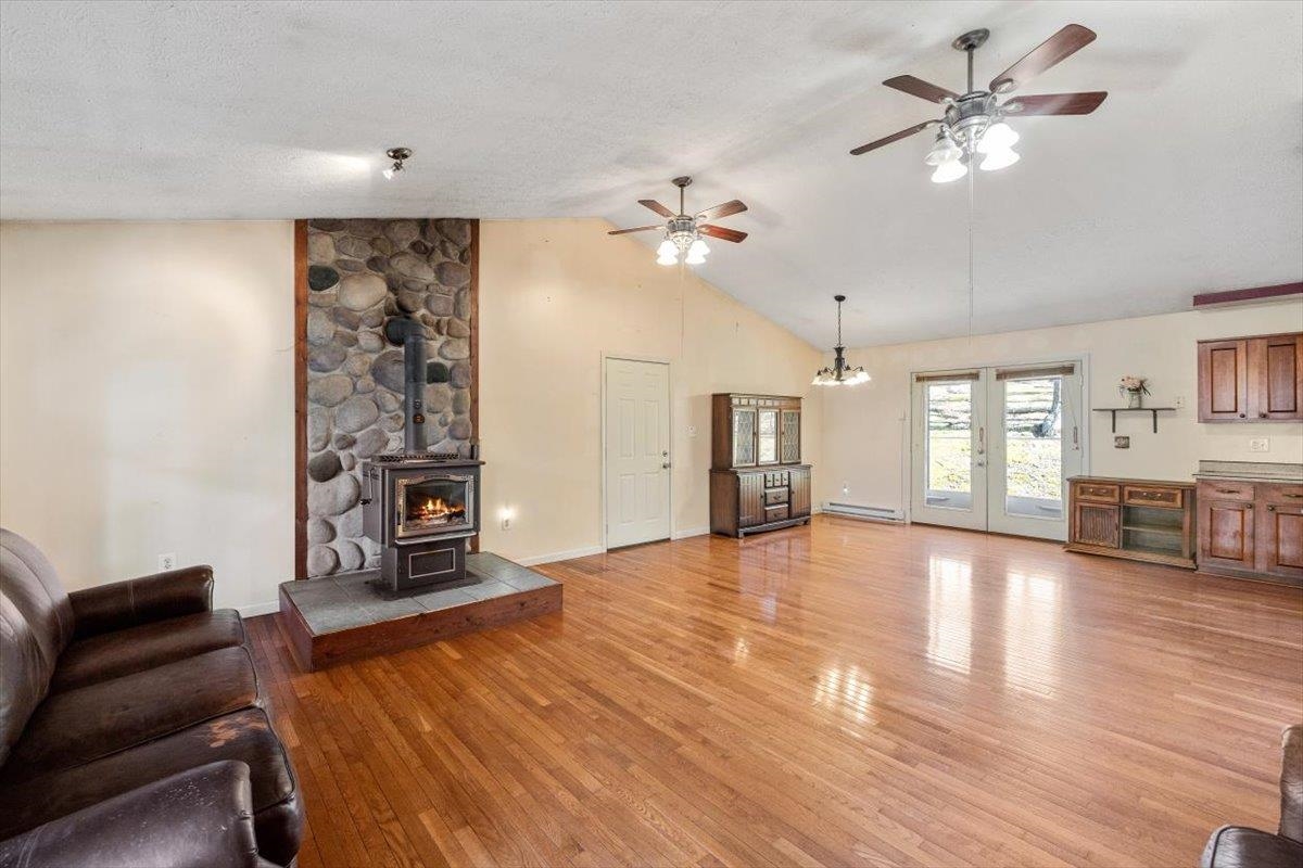 1182 Mullins Road Rio, WV 26755 - Photo 3 of 37 a living room with furniture and a fireplace