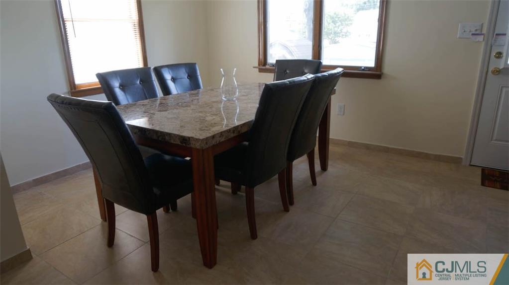 421 Crows Mill Road Fords, NJ 08863 - Photo 8 of 24 a dining room with furniture and window