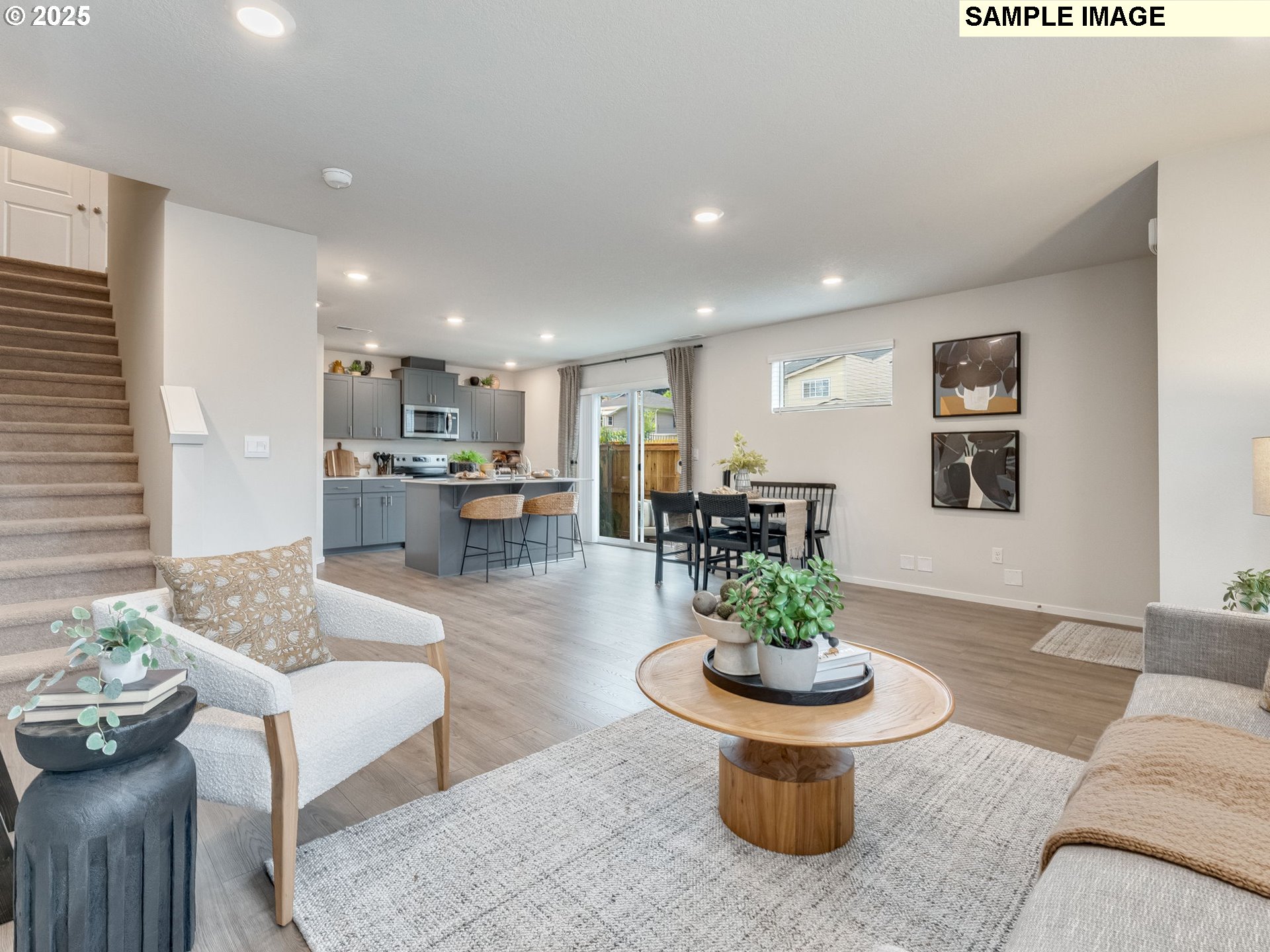 1108 Southeast 194th Place Camas, WA 98607 - Photo 23 of 31 a living room with furniture and a table