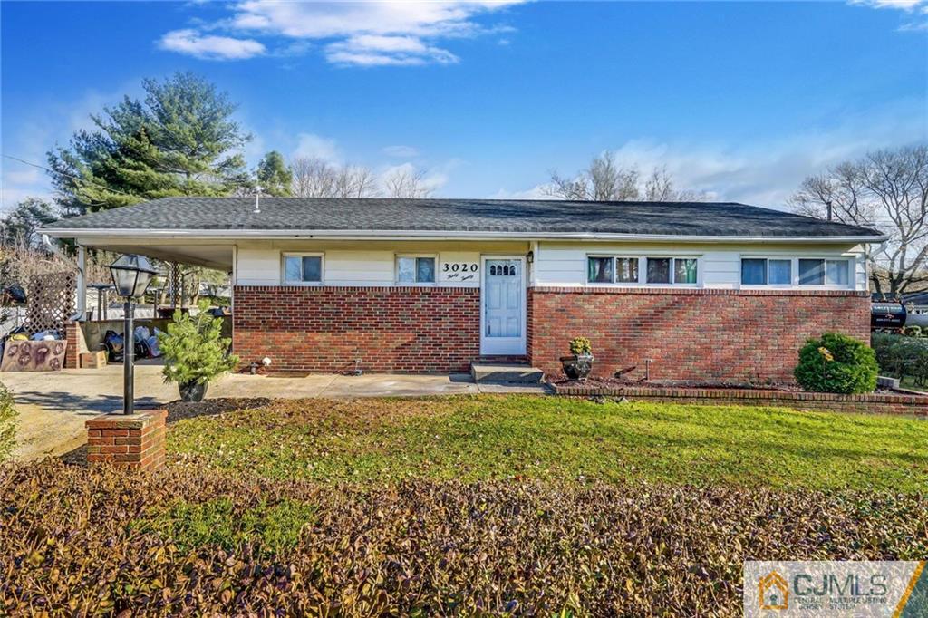 3020 Cheesequake Road Old Bridge, NJ 08859 - Photo 1 of 25 front view of a house with a yard